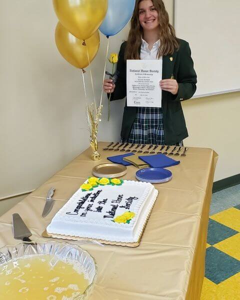 Student at WCA celebrating their induction in to the National Honors Society (NHS)